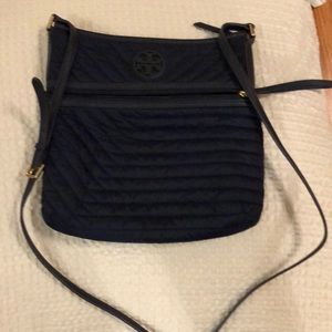 Quilted cross body Tory Burch bag with dust cover